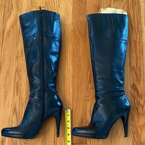Nine West black leather knee high boots.